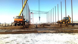 Аренда экскаватора погрузчика с ямобуром в Донецк цена от 1578 руб
