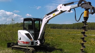 Аренда экскаватора погрузчика с ямобуром в Донецк цена от 1578 руб